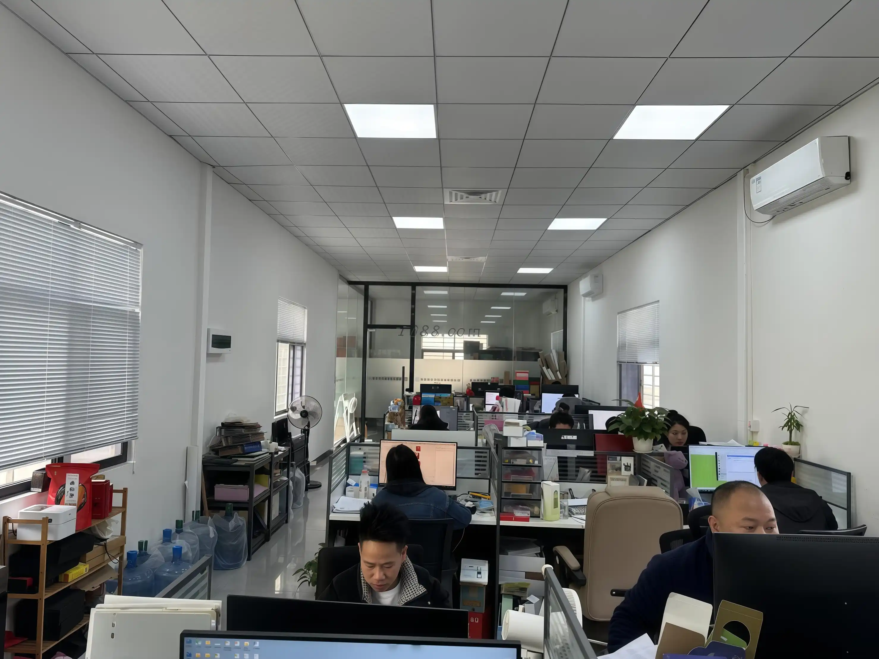 Modern office environment at Wanjia Paper with ergonomic workstations and collaborative spaces