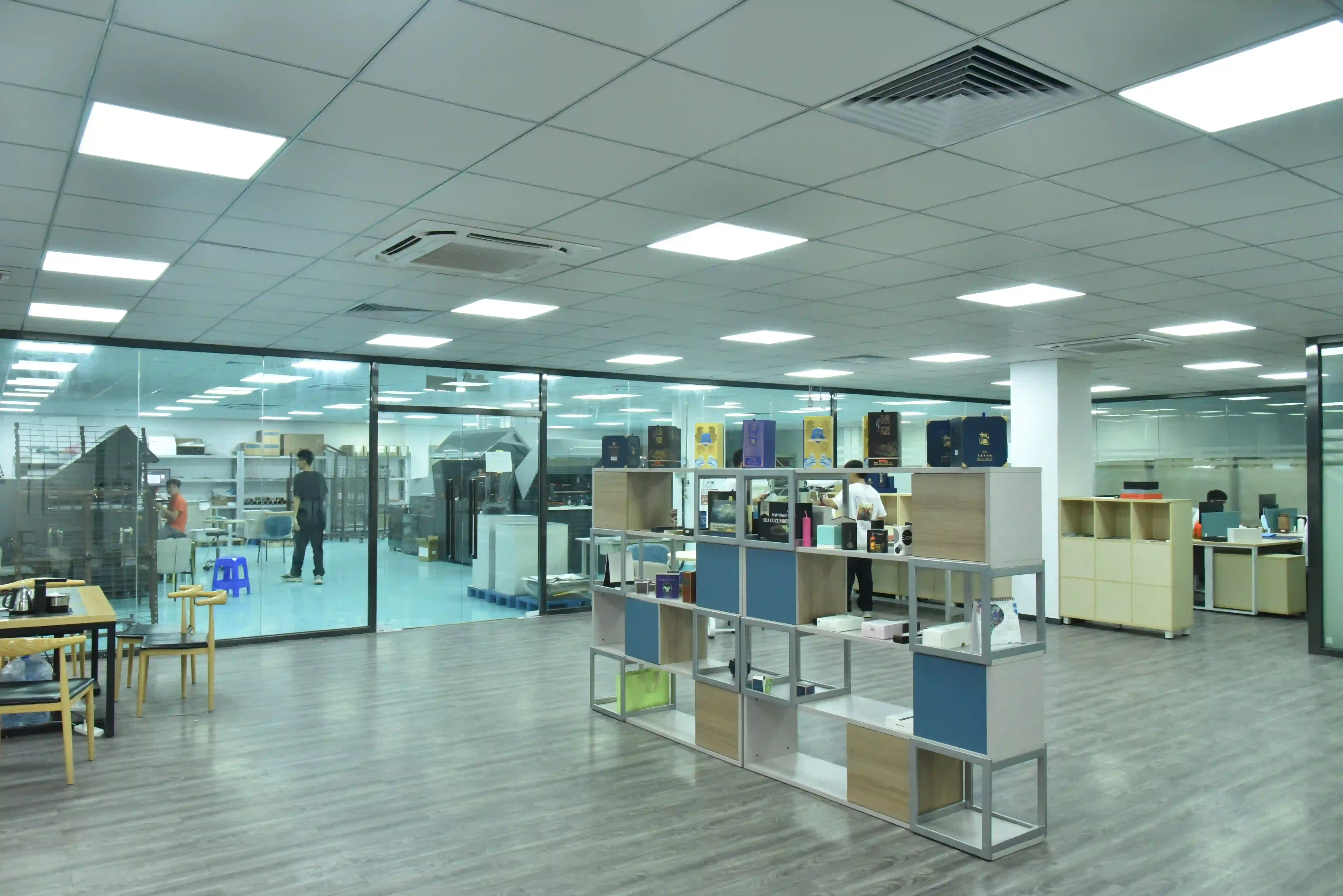 Wanjia Paper Products R&D center laboratory with researchers working on paper product innovations